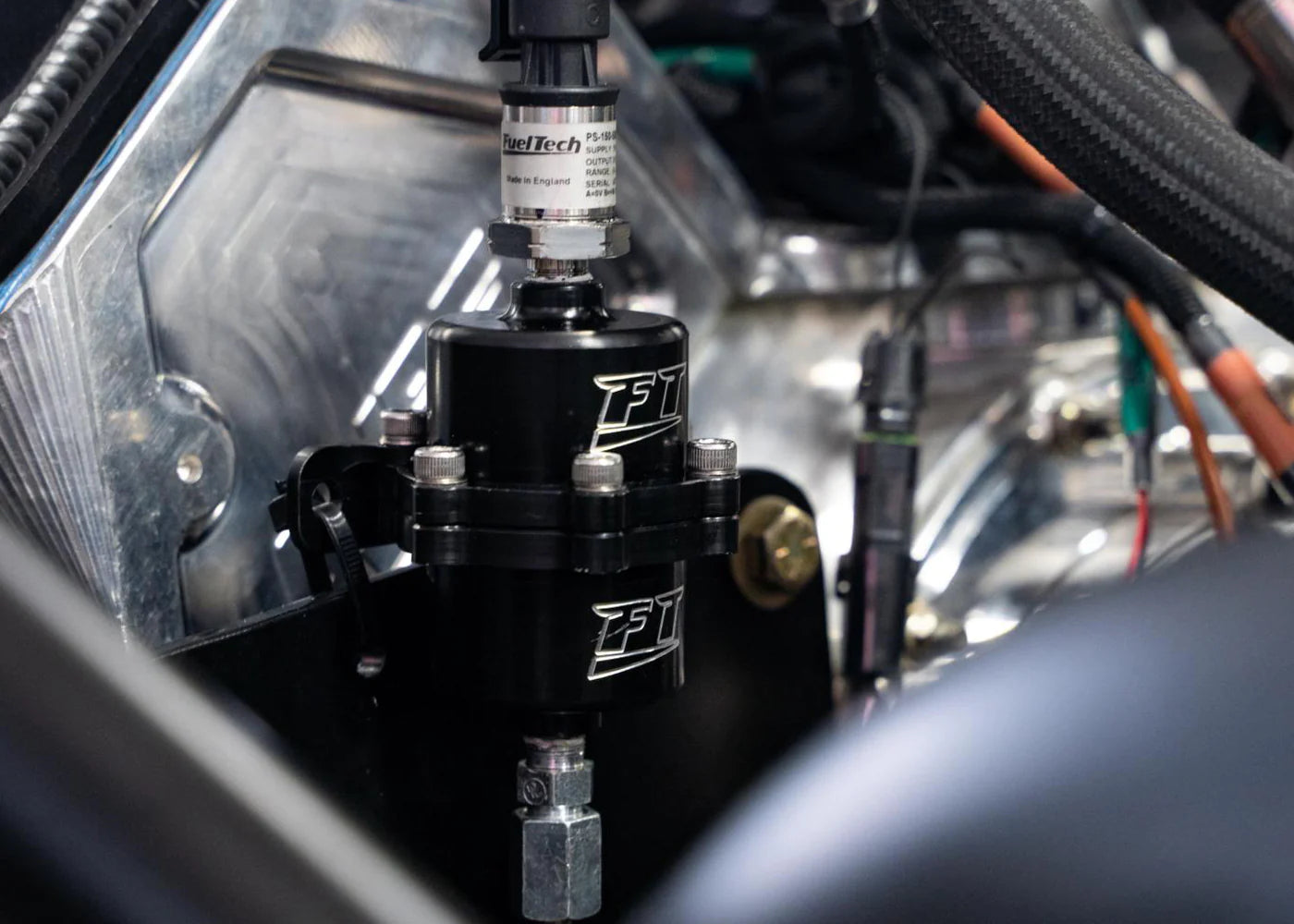 BACKPRESSURE DAMPENING CANISTER